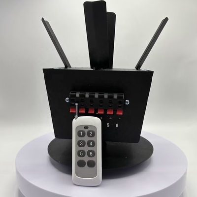 Remote Control Rotating Firing Systems Untuk Air Mancur Tahap Dengan Baterai AA